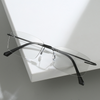 2024 New retro metal rimless anti-blue light color-changing glasses