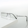 2024 New retro metal rimless anti-blue light color-changing glasses